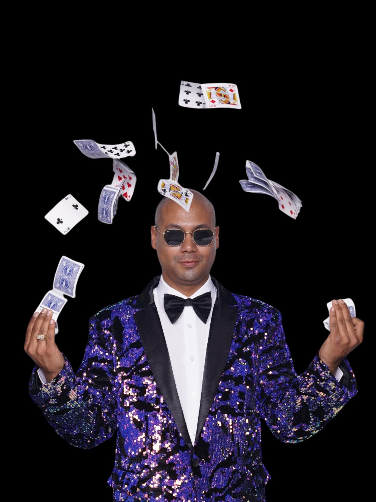 Magic Magic roster performer in purple sequins with playing cards in flight